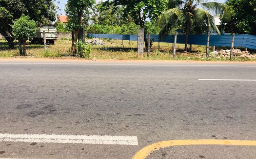 Road facing land for sale in Kopay