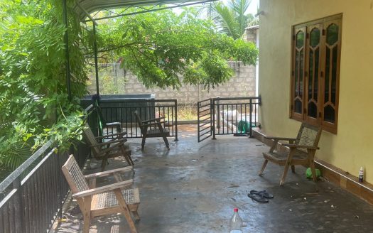 Land with house for sale in Kaithadi
