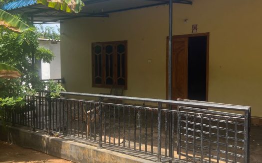 Land with house for sale in Kaithadi
