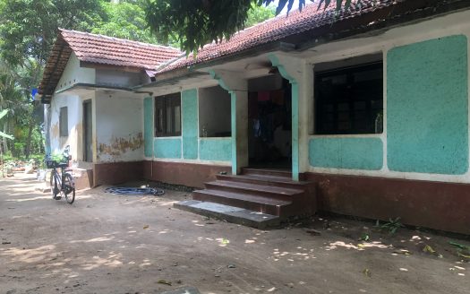 Land with old house for sale in Kopay