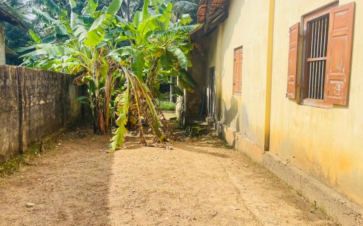 Road facing Land with old house for sale in Hospital Road