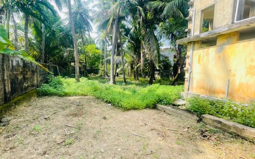 Road facing Land with old house for sale in Hospital Road