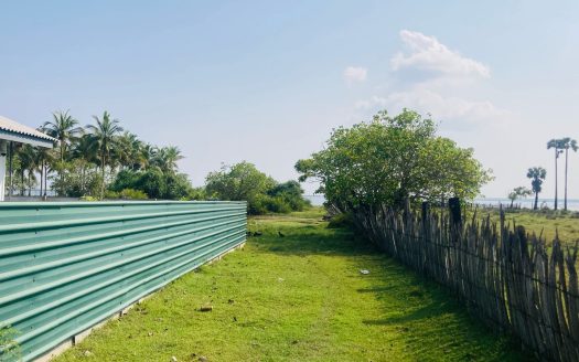 Beach side land with house for sale in velanai